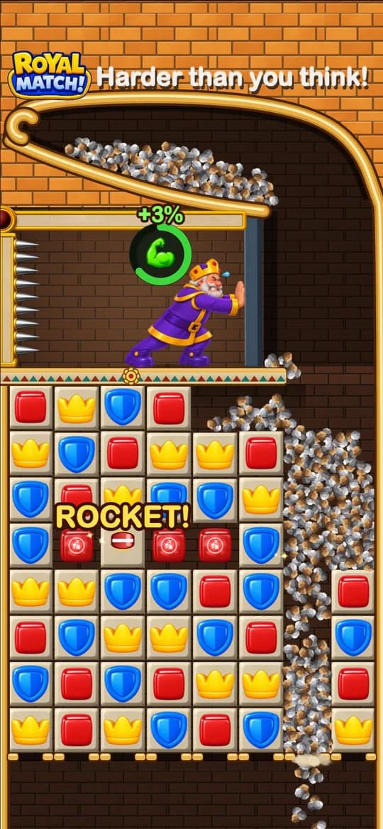Royal Match – King vs Rocks: The King holds back a channel of rocks. Match fast to drain it.